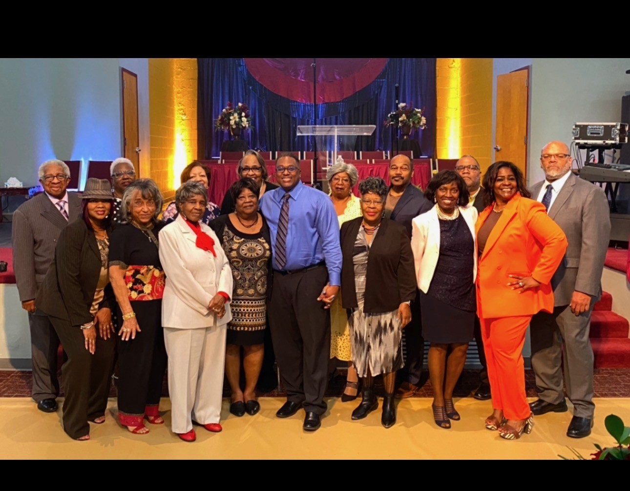 The deacons of Community Evangelistic Church gathered in the sanctuary